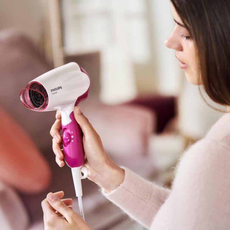 Uscator de par philips salondry compact bhd003/00 ,1400 w, pliabil, alb/roz, l x a x i (mm) 77x114x220,  Uscatoare de par | electropc.ro